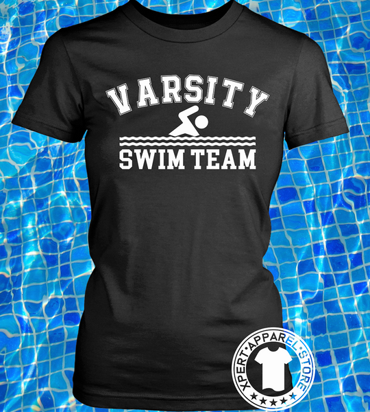 Black t-shirt mock-up with glistening pool water in the background with "Varsity Swim Team" design on the front, from the Xpert Apparel Store.