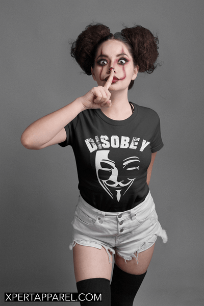 Lady with face paint wearing a Black T-shirt with Disobey  Vendetta Mask Design on the front , available from the Xpert Apparel Store 